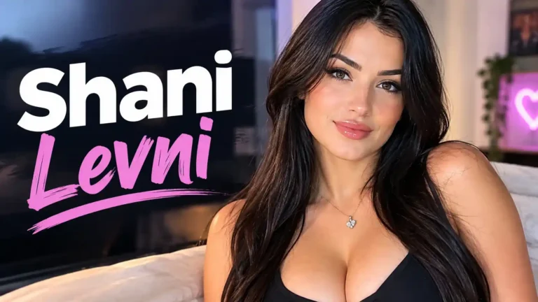 Shani Levni beautiful influencer with long dark wavy hair smiling in black top portrait